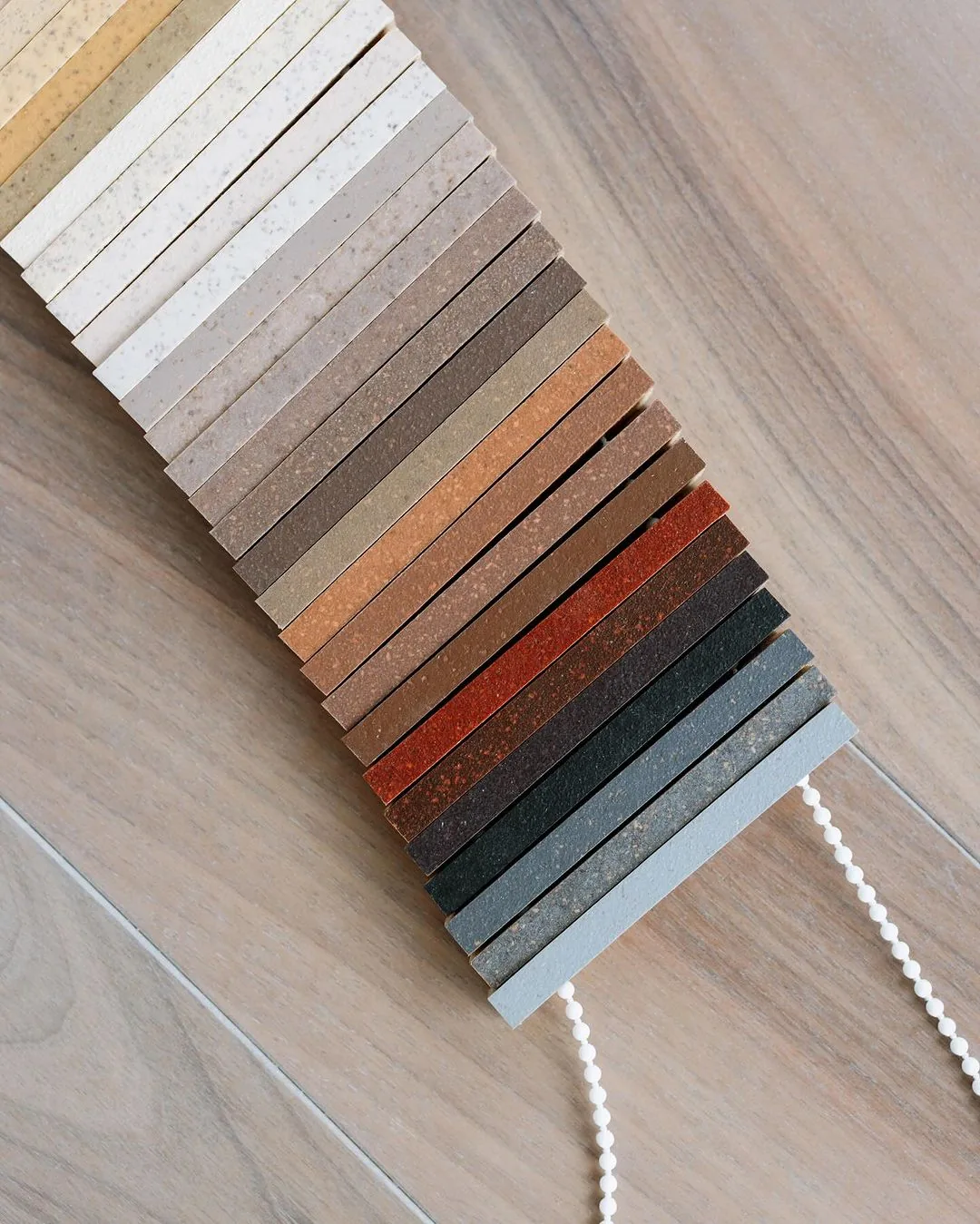 Sample board array showing the full range of Riva Spain finishes against a European oak floor