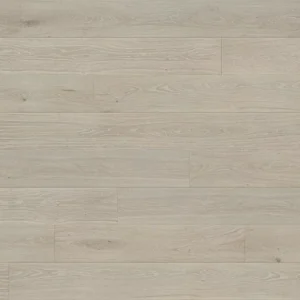 Close-up view of Oahu white oak wood flooring, showcasing its light beige tones and subtle wood grain patterns.